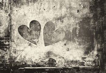 Graffiti heart on the wall in grunge style