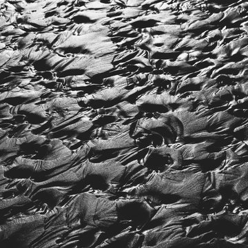 Detail of patterns in sand at low tide