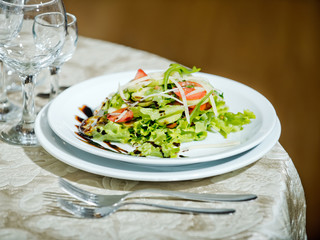 salad served on plate in restaurant