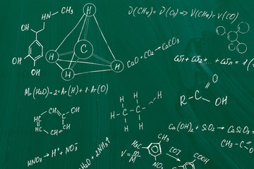 Molecule models and formulas on board background