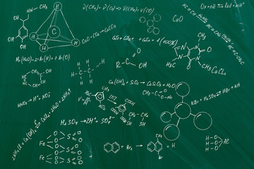 Molecule models and formulas on board background