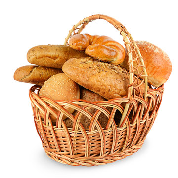 Freshly baked breads (buns, croissants, baguette, cereal bread) in basket