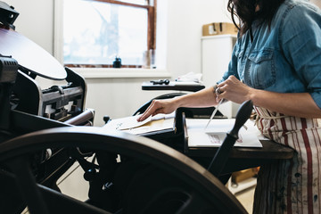 Letterpress artist in her studio
