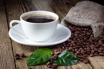 Cup of coffee on wooden rustic table