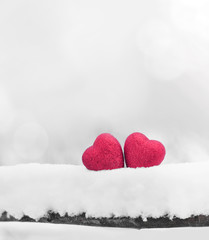 Obraz premium Red heart on snow background. St. Valentine's Day