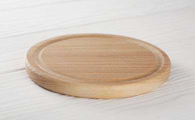wooden cutting board for food on the table