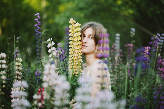 Summer portrait of cute young blonde woman