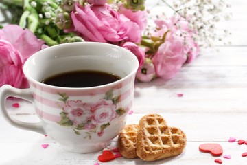 Cup of coffee with heart shaped cookies / Valentine's day frame