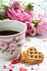 Cup of coffee with heart shaped cookies / Valentine's day frame