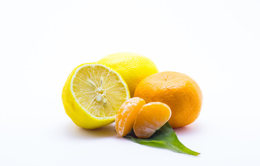Lemon and tangerine on a white background