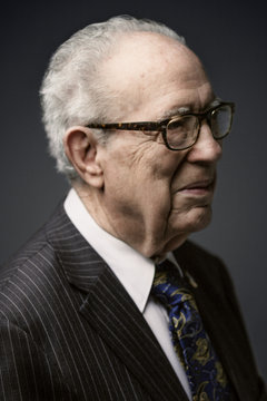 Elderly Man on Dark Background