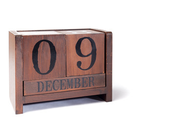 Wooden Perpetual Calendar set to December 9th