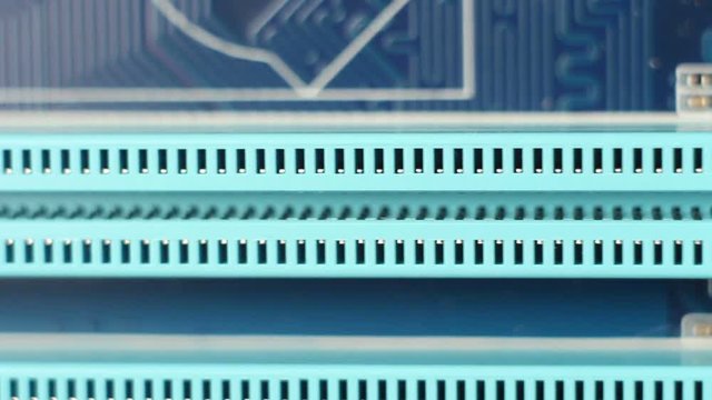 Ram soket on motherboard, selective focus with shallow depth of field. Electronic technology background.
