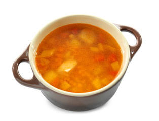 Casserole with tasty lentil soup on white background