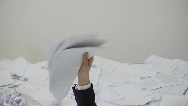 the man found an important document in the bunch of unnecessary documents.