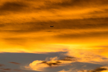 Dramatic sky with orange clouds at sunset