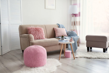 Interior of living room with comfortable sofa