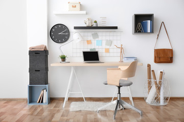 Modern office interior with table and armchair