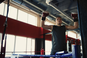 Young man in boxing ring