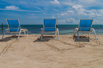 Deckchairs at a beach at Caye Caulker island, Belize