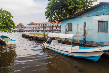 Fototapeta na wymiar Boat and a pier in Livingston village, Guatemala