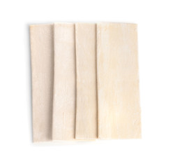 Raw puff pastry on white background