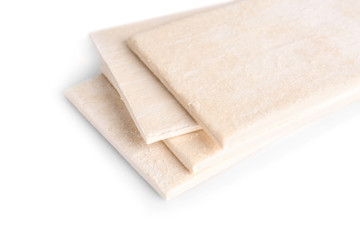 Raw puff pastry on white background