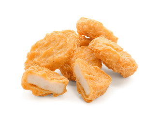 Tasty chicken nuggets on white background