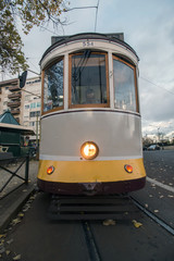 Historical yellow tram on Lisbon city, Portugal.