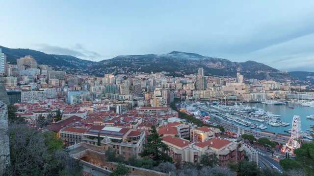 Panoramic day to night time lapse video of Monaco: La Condamine area and port Hercule
