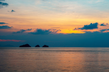 Naklejka na ściany i meble Spectacular sunset over sea lagoon and islands in the summer