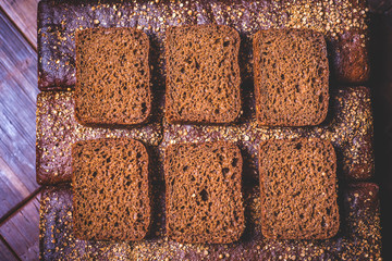 Top view of six pieces of rye bread.