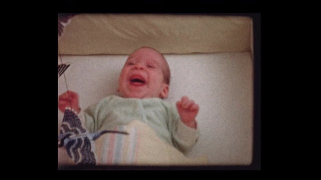 1959 Happy 2 month old infant baby boy in crib