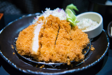 Fried pork tongkatsu with mashed potatoes and vegetable