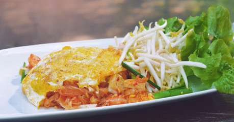Traditional pad thai noodle stir-fry with prawns, tofu and vegetables.