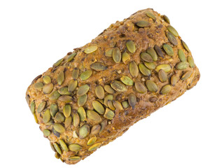 A loaf of bread from wheat flour with sunflower, pumpkin, caraway, cereal and sesame seeds. Isolated. Top view.