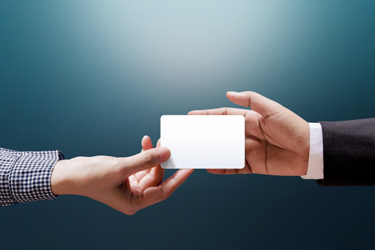 Hand of Woman giving a Blank Business Card to Businessman, Mockup White Card