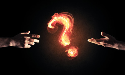 Concept of help or support with fire burning question mark and c