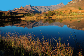 Mountains with reflection in water, Royal Natal National Park, South Africa.