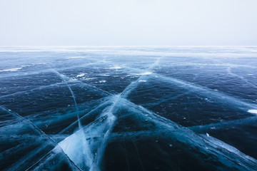 Beautiful ice with cracks on the Lake Baikal.