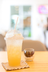 Plastic iced cup of summer lemonade, iced tea, and limeade drinks