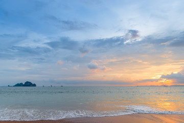 beautiful orange sunset in the lower right corner of the frame, Thailand's sea landscape