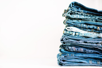 Jeans things stacked stack. Isolated on white background