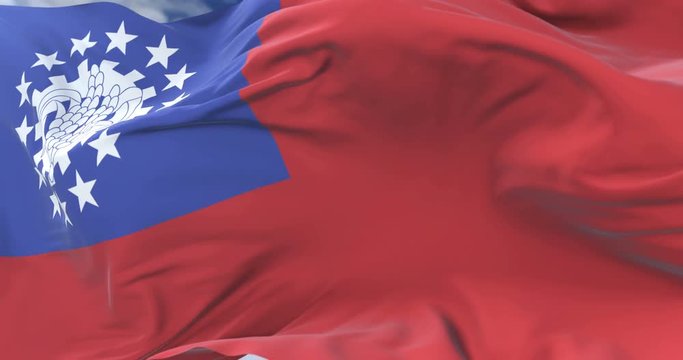 Flag of Myanmar or Union of Burma waving at wind in slow, loop