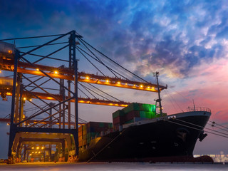 Container operation in port terminal on night time.