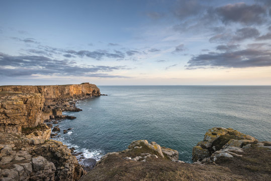 Stunning vibrant landscape image of cliffs around St Govan's Head on Pembrokeshire Coast in Wales