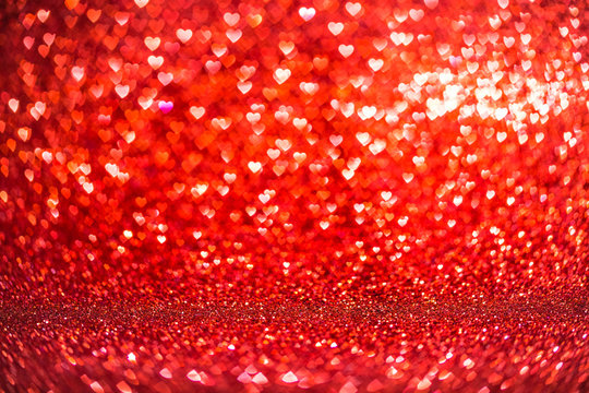 Red Hearts Background with Bright Bokeh Lights for Valentine's Day or Christmas