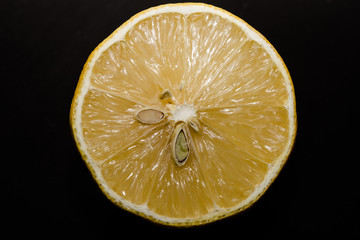 half a lemon on the black
