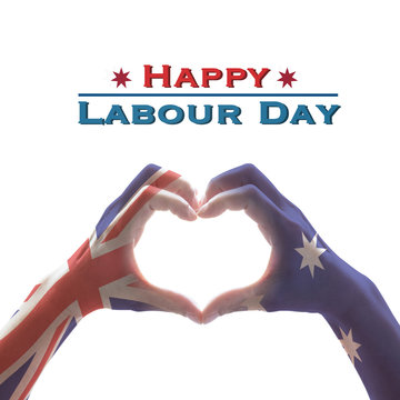 Happy labour day with Australia flag pattern on people hands in heart shape on whitw background