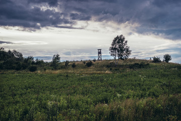Meadow with hunting tower in Polish Jurassic Highland, Silesia region in Poland